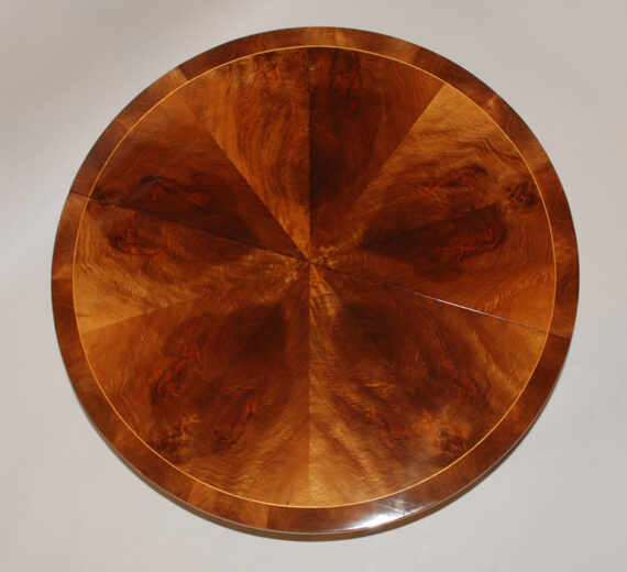 An exceptional Neoclassical extendable dining table