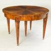 An exceptional Neoclassical extendable dining table