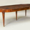 An exceptional Neoclassical extendable dining table