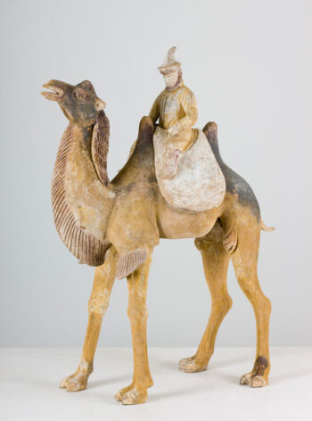 Striding Bactrian camel with Persian rider
