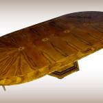 A Vienna Biedermeier inspired trumpet style extendable dining table