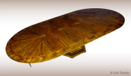 A Vienna Biedermeier inspired trumpet style extendable dining table 1