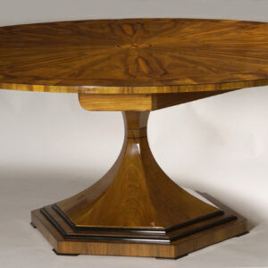 A Vienna Biedermeier inspired trumpet style extendable dining table