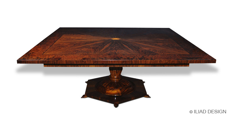 A grand Biedermeier style single pedestal extendable dining table