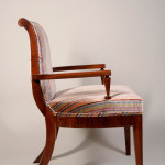 An Austrian Neoclassical style  game table armchair