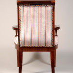An Austrian Neoclassical style  game table armchair