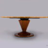 A large single pedestal table