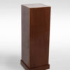 A modernist walnut pedestal by ILIAD Design
