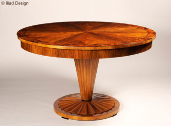 A Biedermeier inspired extendable dining table in the manner of Josef Danhauser