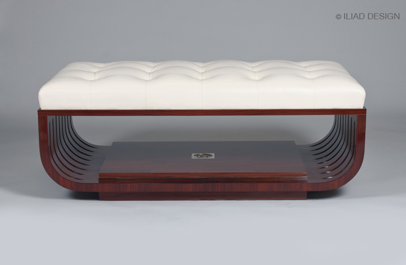 A Modernist style upholstered ottoman 2