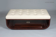 A Modernist style upholstered ottoman 3