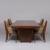 A set of six Captain dining chairs in the style of D.I.M
