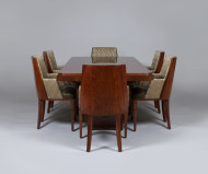 A set of six Captain dining chairs in the style of D.I