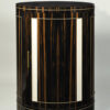 An Art Deco inspired Oval Pedestal Cabinet by ILIAD Design
