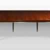 A Mid-Century Style Dining Table by ILIAD Design