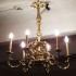 An second Rococco six arm chandelier