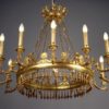 A magnificent twelve arm Empire chandelier