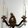 A pair of second Rococco two arm wall sconces