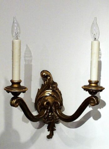 A pair of second Rococco two arm wall sconces