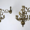 A pair of bronze seven-arm sconces