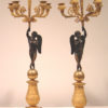 A fine pair of Empire five-arm candlesticks