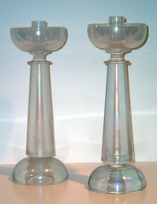 A pair of pearlesant Murano glass candlesticks