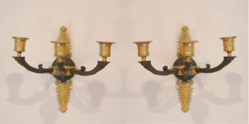 A pair of Empire three arm wall sconces
