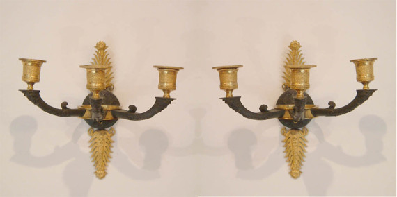 A pair of Empire three arm wall sconces