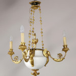 An unusual Empire three-arm chandelier