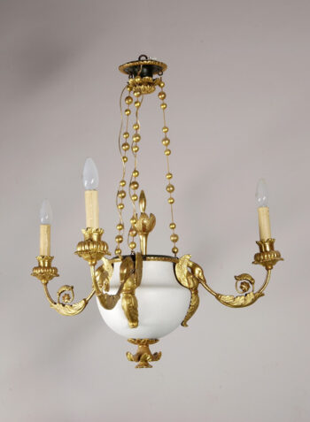 An unusual Empire three-arm chandelier