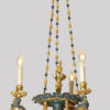 An elegant Empire three-arm chandelier