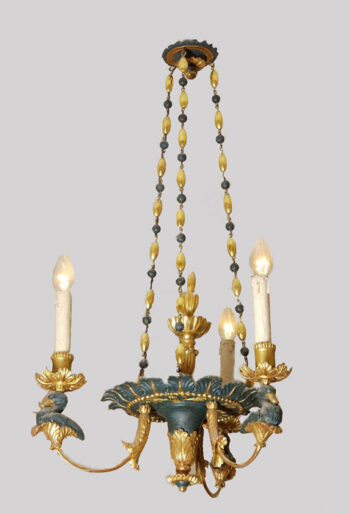 An elegant Empire three-arm chandelier