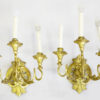 An elegant pair of three arm Neoclassical candle sconces