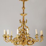 A exceptional Neoclassical twelve arm chandelier