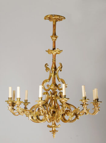 A exceptional Neoclassical twelve arm chandelier