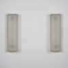 A pair of modernist light sconces by Genet et Michon