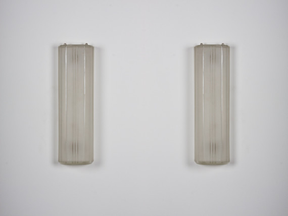 A pair of modernist light sconces by Genet et Michon
