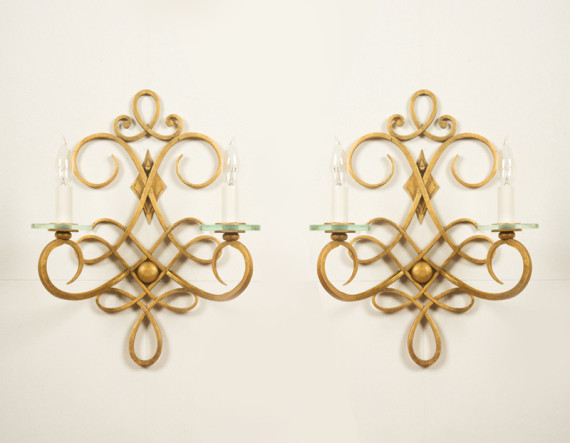 A pair of French '40s forged iron wall sconces