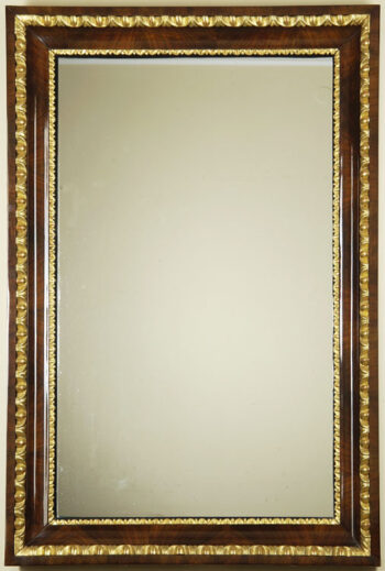 A Biedermeier mirror with egg and dart detail