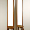 A pair of unusual Asian inspired tall and narrow Art Deco mirror consoles