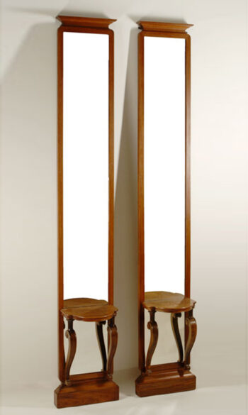 A pair of unusual Asian inspired tall and narrow Art Deco mirror consoles