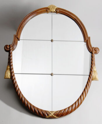 An Art Deco oval mirror