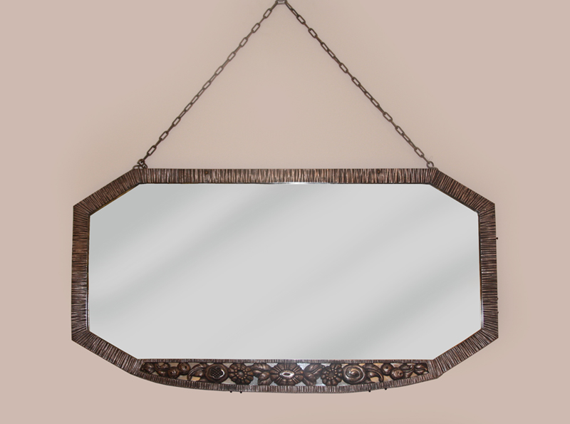 A hanging Art Deco mirror