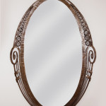 An Art Deco forged iron mirror