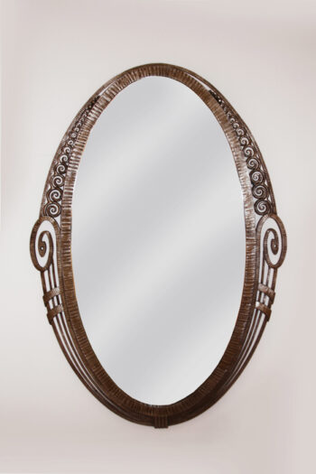 An Art Deco forged iron mirror