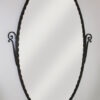 An Art Deco forged iron mirror attributed to Nics Freres