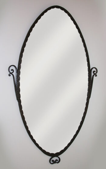 An Art Deco forged iron mirror