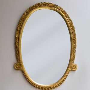 A wall mirror by Maurice Dufrene