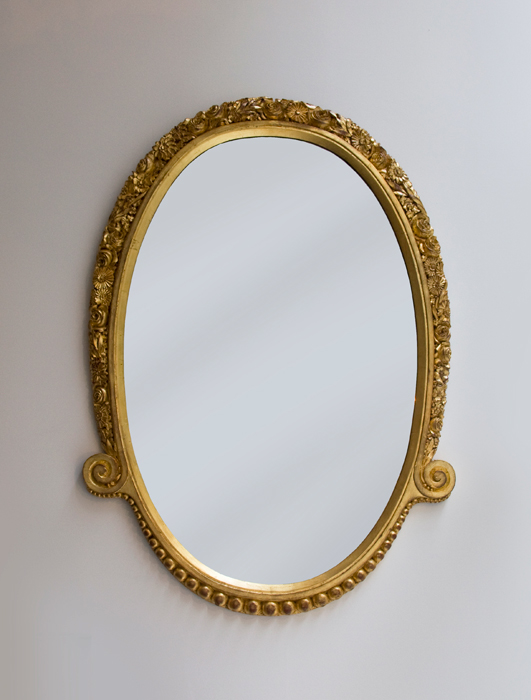 A wall mirror by Maurice Dufrene