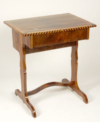 An unusual Biedermeier sewing/occasional table